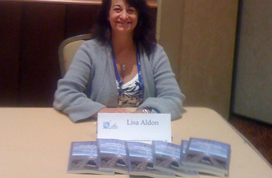 Book signing at the International Leadership Association Conference
